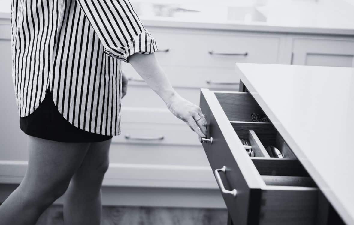 Someone opening a draw in our kitchen showroom